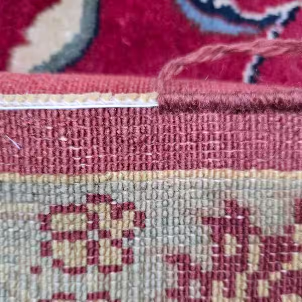 Expert Oriental rug fringe removal and edge stabilisation service