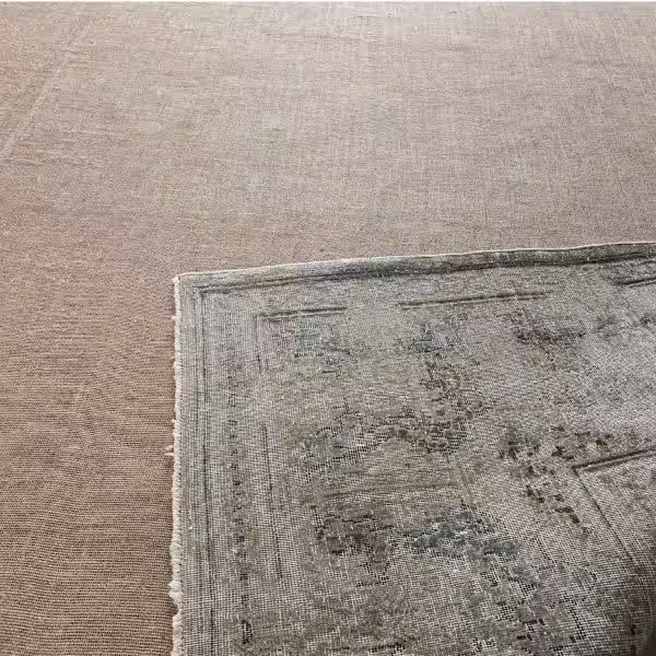 Persian rug backing repair and structural stabilisation by Auckland rug specialist