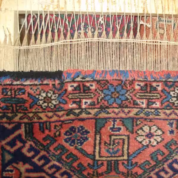 Professional rug fringe repair in Auckland restoring damaged rug edges with hand-knotting techniques