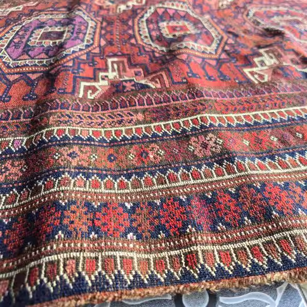 Rug showing ripples waves and buckling before flattening and structural correction process