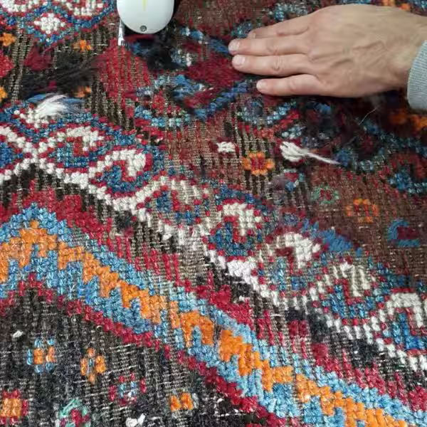 Before and after rug repiling restoring worn pile in Persian rug Auckland workshop