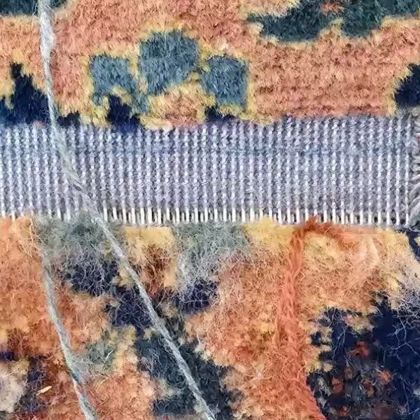 after rug reweaving repair of damaged Persian rug showing structural reconstruction in Auckland workshop