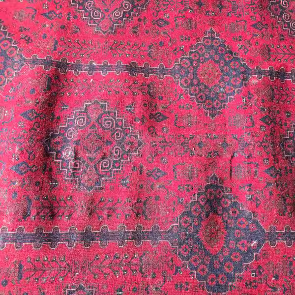 Professional rug stretching services in Auckland correcting ripples waves and structural distortion in handmade rugs