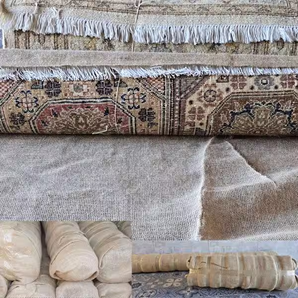 Professional rug wrapping and protective storage preparation for Persian and wool rugs to prevent dust, moisture, and fibre damage during storage