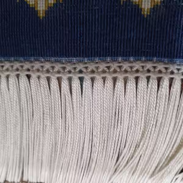 Professional silk rug repair in Auckland restoring the rug to its original condition with expert hand restoration techniques by The Rug Guru