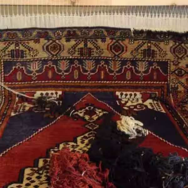 Professional Turkish rug fringe repair in Auckland restoring damaged fringe back to its original condition through expert hand restoration techniques