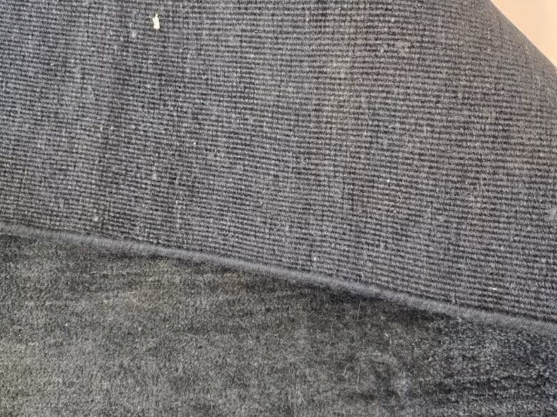 Antique Oriental rug restoration addressing fading and restoring visual depth