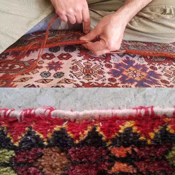 Expert rug binding repair on antique handmade rug restoring weakened edges with fibre-matched stitching
