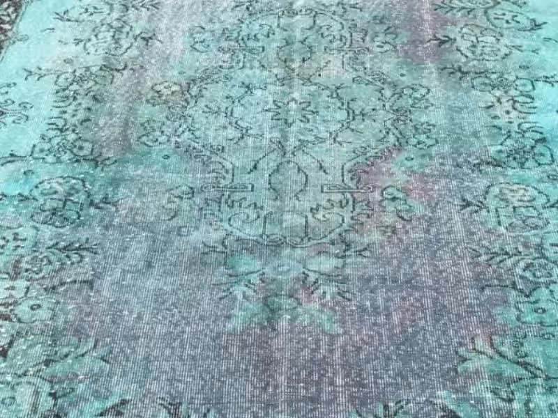 Antique rug overdye process in Auckland using fibre-safe controlled colour restyling