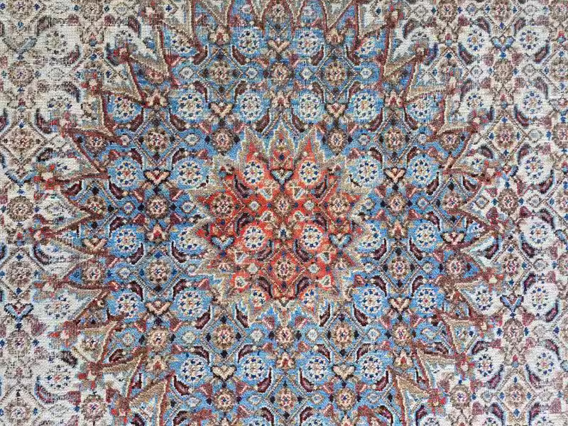 Handmade rug colour restoration addressing fading and restoring balanced tonal appearance