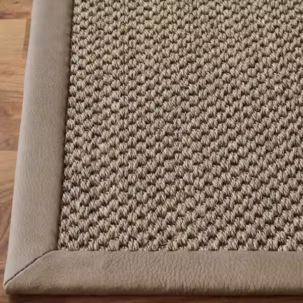 Finished rug border with leather marine edging for custom wide border finishing by The Rug Guru