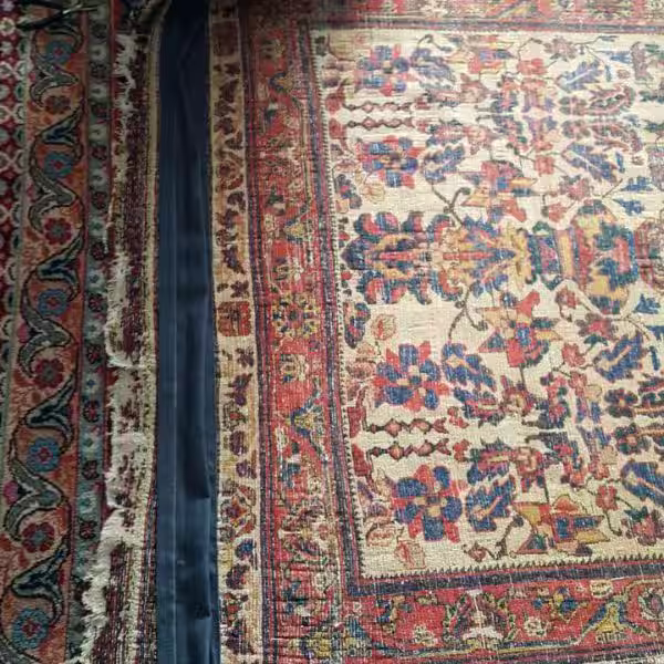oriental rug installed as feature wall display in modern Auckland interior using support system