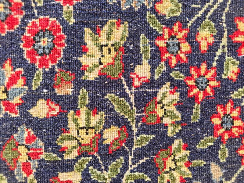 Oriental rug medallion and central design restoration with controlled colour correction