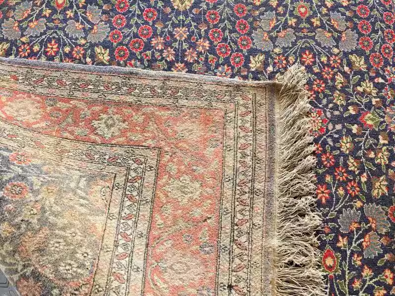 Oriental rug tonal balance restoration improving colour uniformity and design harmony