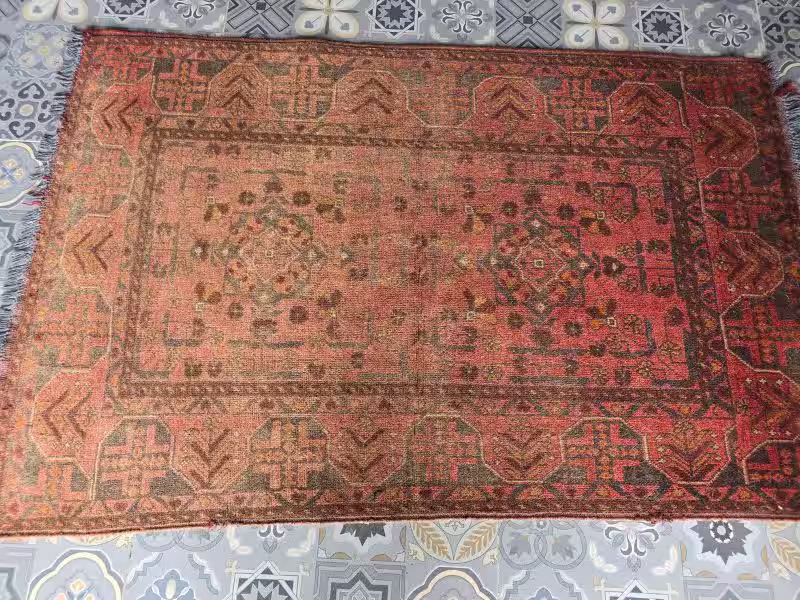 Persian rug colour restoration improving faded motifs and restoring visual clarity in Auckland